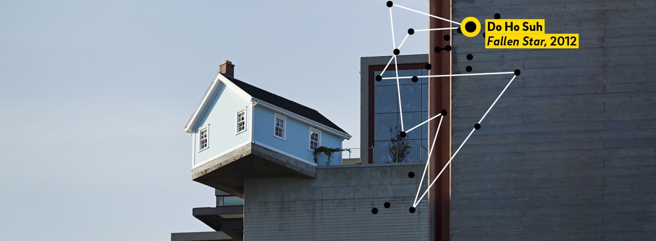 Fallen Star sculpture (blue house on corner of roof) with Stuart Collection graphic logo.